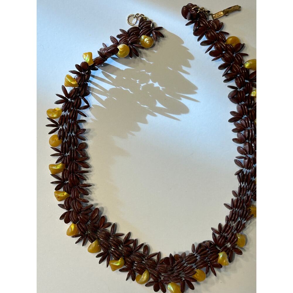 Apple seed necklace with yellow snail shell dangles boho tropical statement